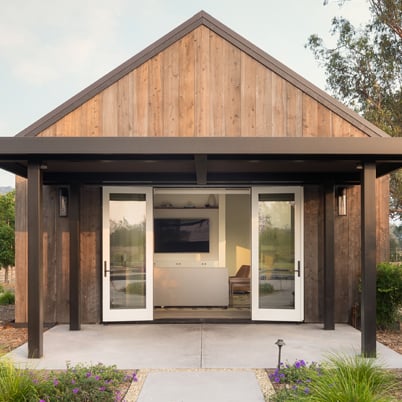 Pool house with double opening hinged patio doors